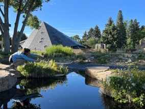 Collecting seeds in the Steppe Garden, in front of the Science Pyramid.