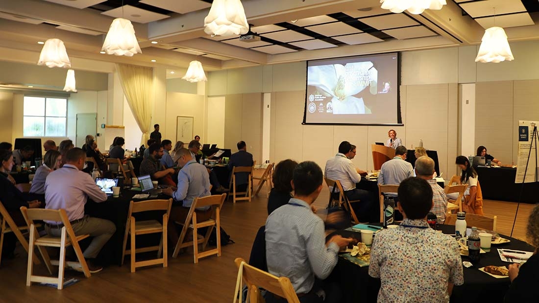 People at tables in ballroom for convention