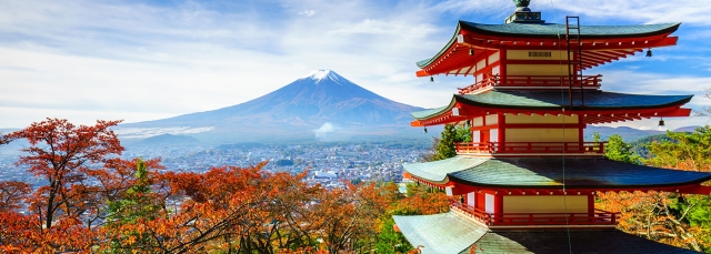 Mount Fuji lightly topped by snow with Chureito Pagoda in the foreground