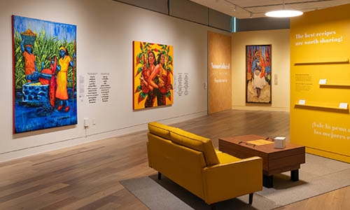 yellow couch in art gallery thumbnail