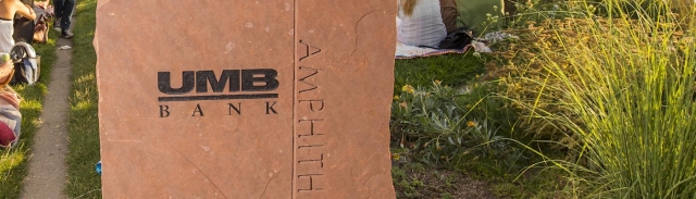 Engraved slate that says "UMB Bank Amphitheater"